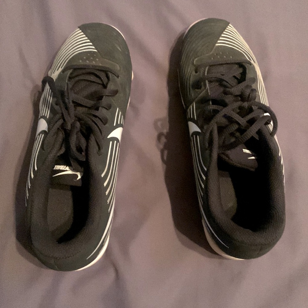 Black and white Size 7 Nike softball cleats. Brand new. Worn two times.